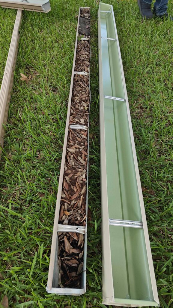 Old 5-inch gutter full of leaves versus New 6-inch gutter